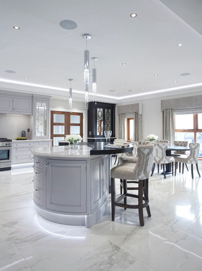 Design ideas for a medium sized contemporary l-shaped open plan kitchen in Belfast with an integrated sink, beaded cabinets, black cabinets, quartz worktops, white splashback, stone slab splashback, stainless steel appliances, marble flooring and an island.