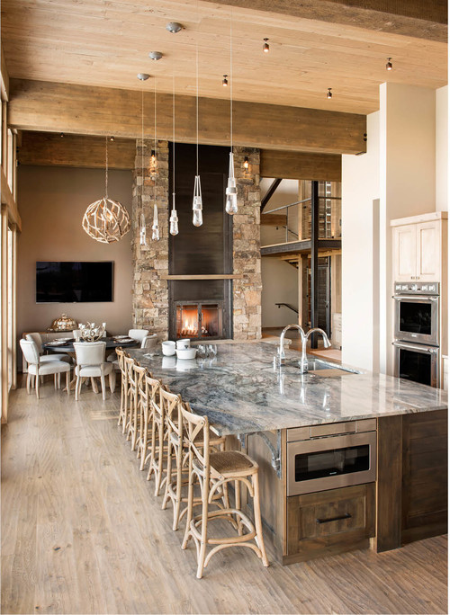 Gray Elegance: Gray Quartzite Countertops with Dark and Light Wood Shaker Cabinets