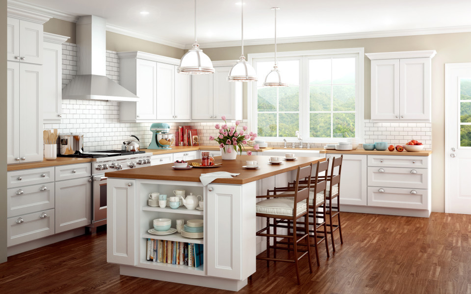 Inspiration for a medium sized traditional l-shaped kitchen/diner in Philadelphia with recessed-panel cabinets, granite worktops, stainless steel appliances and an island.