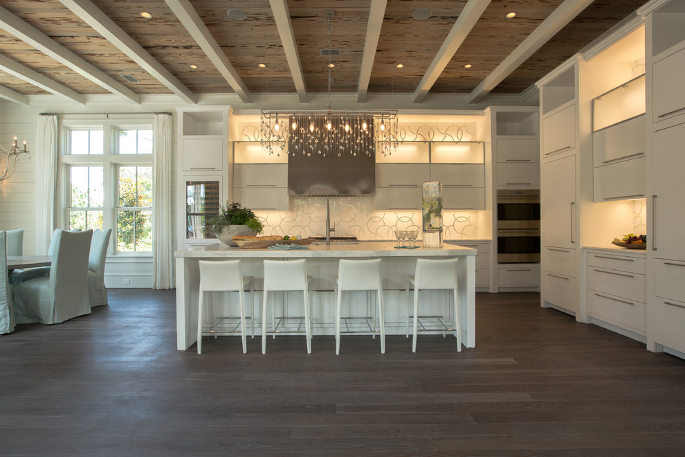 Eat-in kitchen - transitional l-shaped eat-in kitchen idea in Miami with a single-bowl sink, flat-panel cabinets, white cabinets, marble countertops, white backsplash, mosaic tile backsplash and white appliances