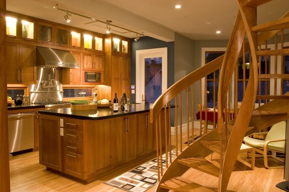 Trendy kitchen photo in San Francisco with granite countertops and an island