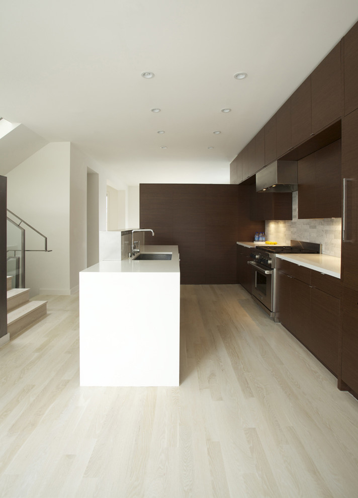 Example of a minimalist kitchen design in San Francisco with stainless steel appliances