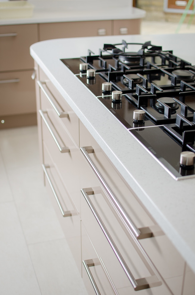 Make a spacious modern kitchen feel warm and inviting with pale coffee