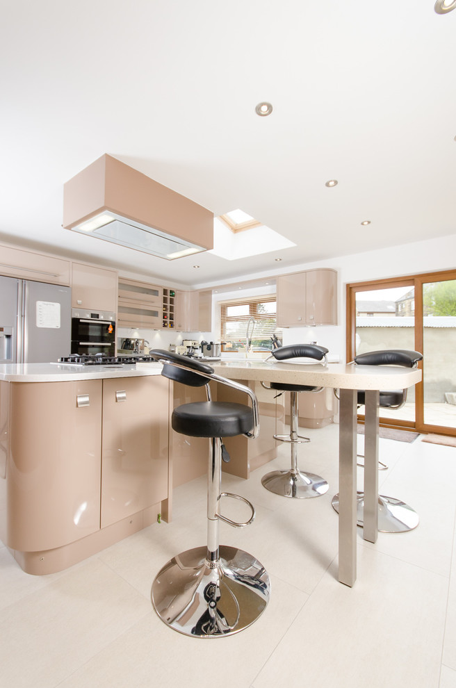 Make a spacious modern kitchen feel warm and inviting with pale coffee