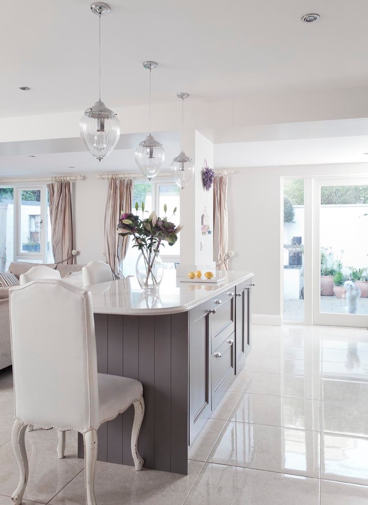 Inspiration for a large classic u-shaped open plan kitchen in Other with a submerged sink, beaded cabinets, grey cabinets, quartz worktops, grey splashback, stone slab splashback, stainless steel appliances, porcelain flooring, an island and grey floors.