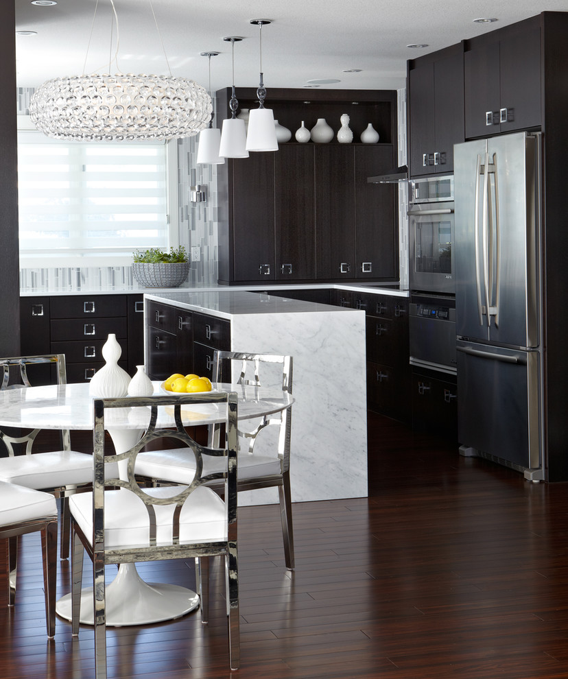 Contemporary kitchen/diner in Other with flat-panel cabinets and black cabinets.