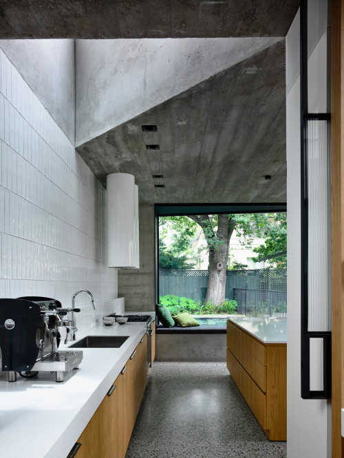 Embrace Nature with Minimalist Kitchen Ideas: Natural Wood Cabinetry and Glossy White Backsplash Tiles