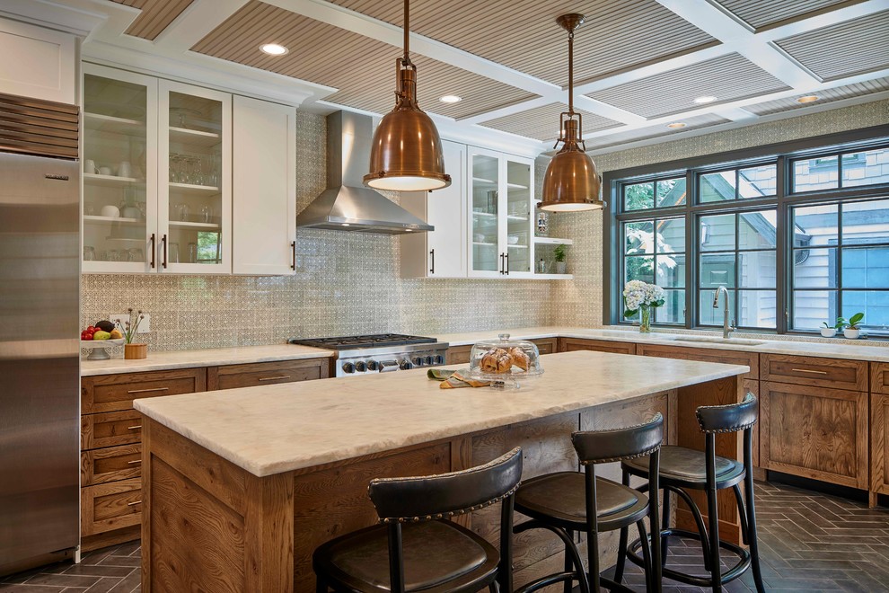 Inspiration for a mid-sized transitional l-shaped ceramic tile and brown floor enclosed kitchen remodel in Chicago with an undermount sink, recessed-panel cabinets, distressed cabinets, quartzite countertops, beige backsplash, ceramic backsplash, stainless steel appliances and an island