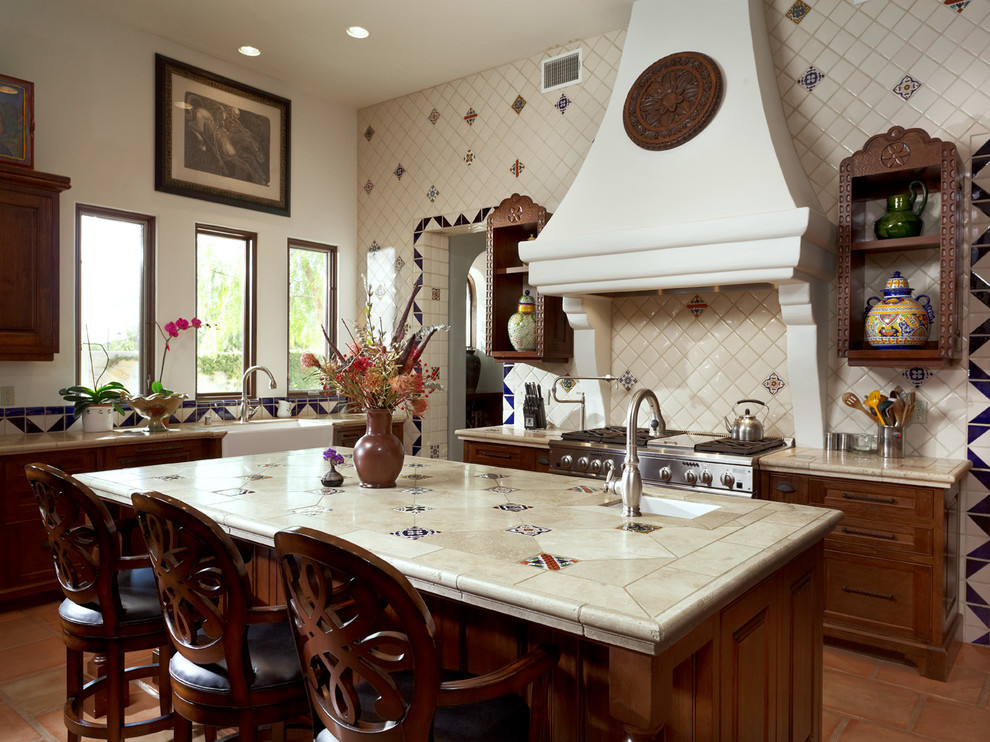 Example of a tuscan kitchen design in Other with a farmhouse sink