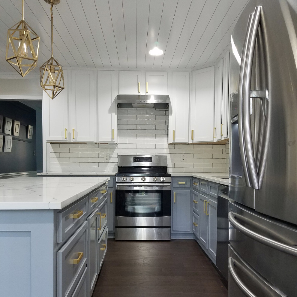 Design ideas for a medium sized modern galley kitchen in Atlanta with shaker cabinets, ceramic splashback, stainless steel appliances and an island.