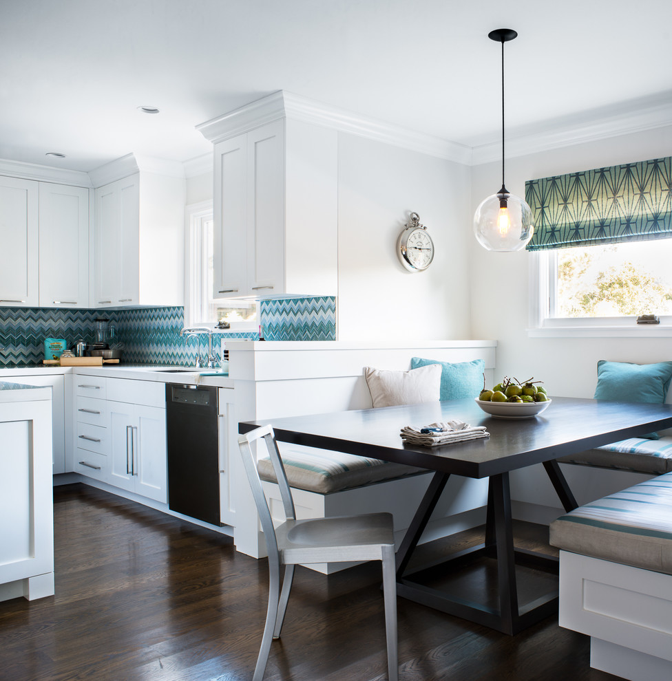 Trendy eat-in kitchen photo in San Francisco with shaker cabinets, white cabinets and blue backsplash