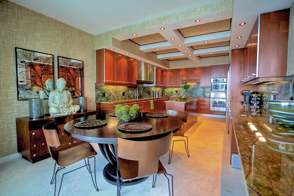 Example of a minimalist u-shaped eat-in kitchen design in Miami with flat-panel cabinets, dark wood cabinets, marble countertops, stone slab backsplash, stainless steel appliances and an island