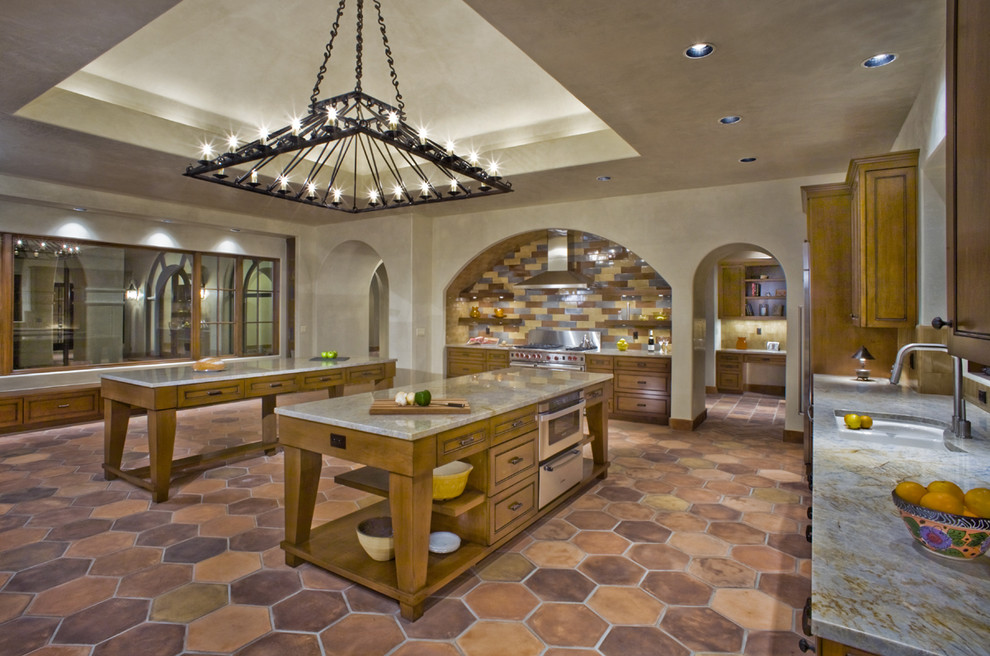 This is an example of a mediterranean kitchen in Austin with quartz worktops.