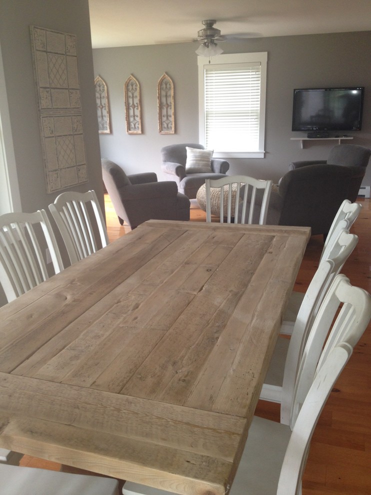 Example of a beach style dining room design in Boston