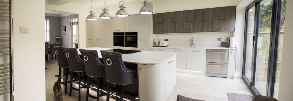 Inspiration for a modern kitchen in Hertfordshire with an island.