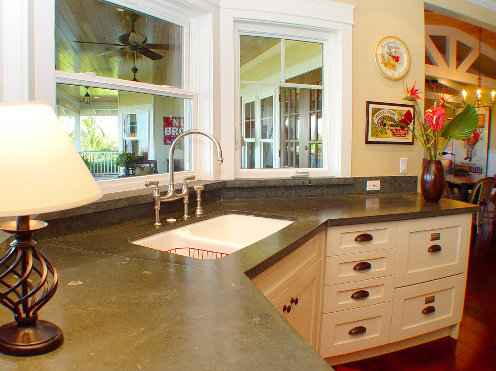 World-inspired kitchen in Hawaii with limestone worktops.