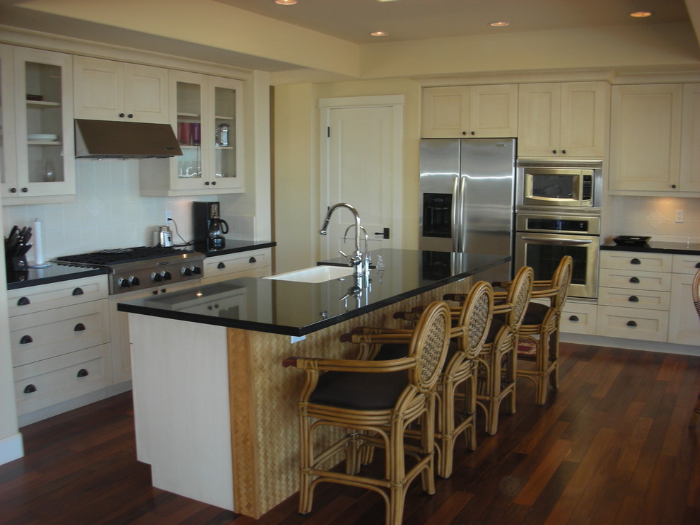 World-inspired kitchen in Hawaii with shaker cabinets.