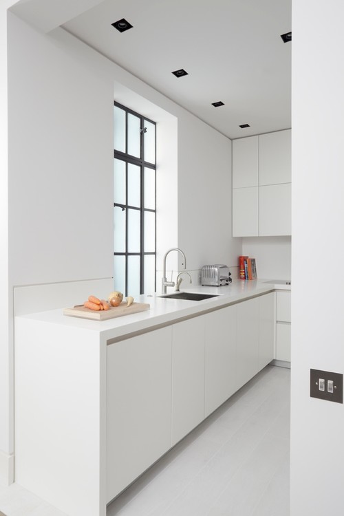 Achieve a Clean Look with Minimalist Kitchen Ideas: Small-Space Simplicity and a White Color Scheme