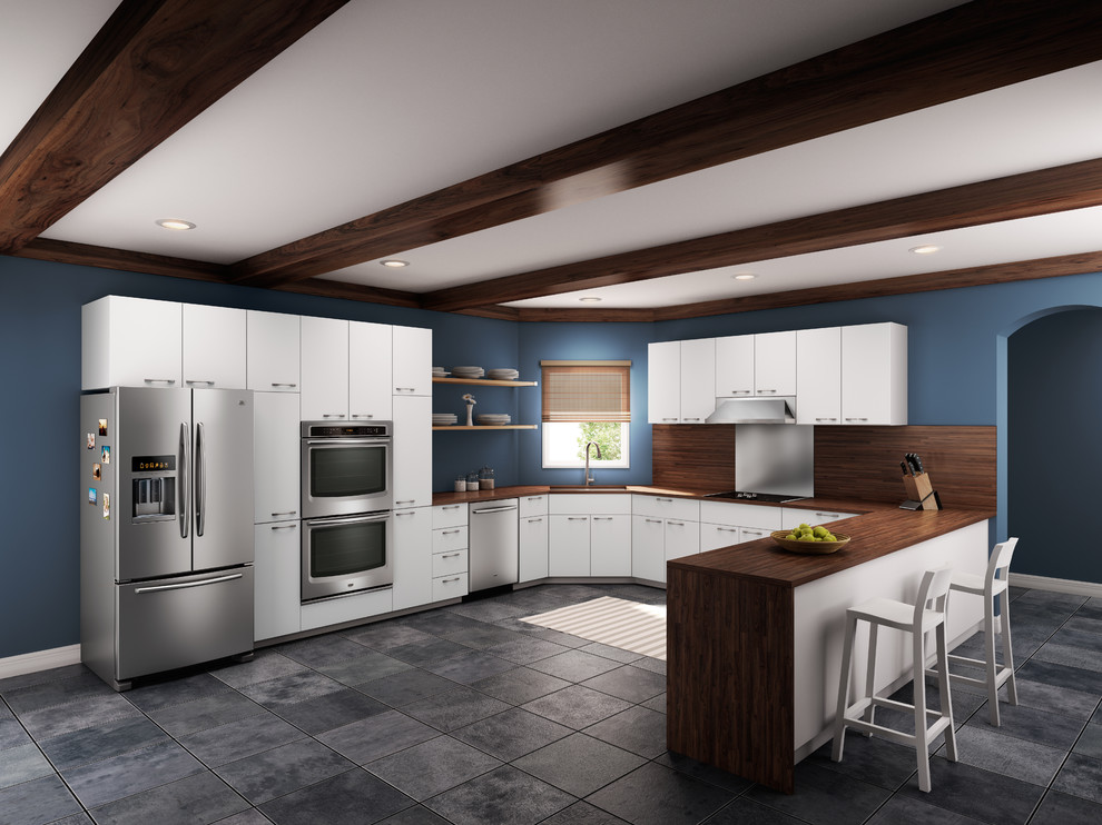 Design ideas for a large classic l-shaped kitchen/diner in New York with a submerged sink, flat-panel cabinets, white cabinets, wood worktops, metallic splashback, metal splashback, stainless steel appliances, slate flooring and a breakfast bar.