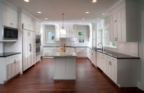 Spacious Canadian kitchen with white shaker cabinets, island, and modern appliances—highlighting RTA Depot plywood construction and premium finishes
