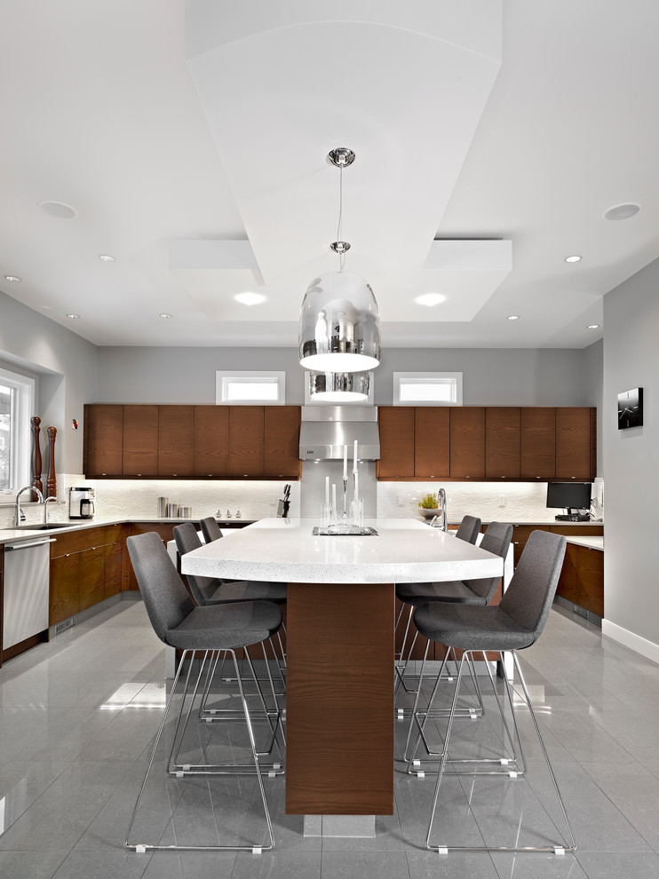 Example of a trendy eat-in kitchen design in Edmonton with flat-panel cabinets, dark wood cabinets and two islands
