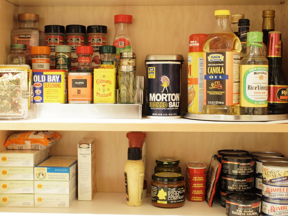 This is an example of a medium sized contemporary kitchen pantry in New York.