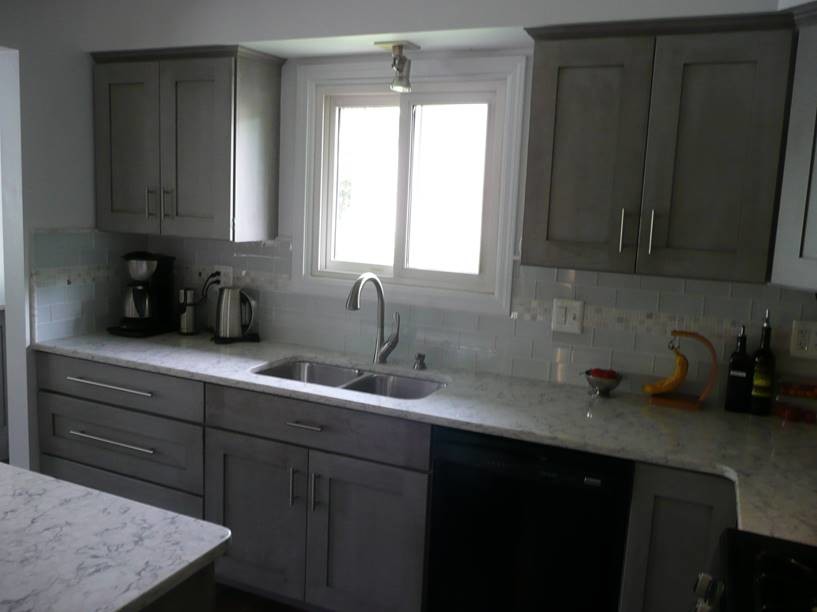 Medallion Cherry Peppercorn with Rococo Quartz countertops