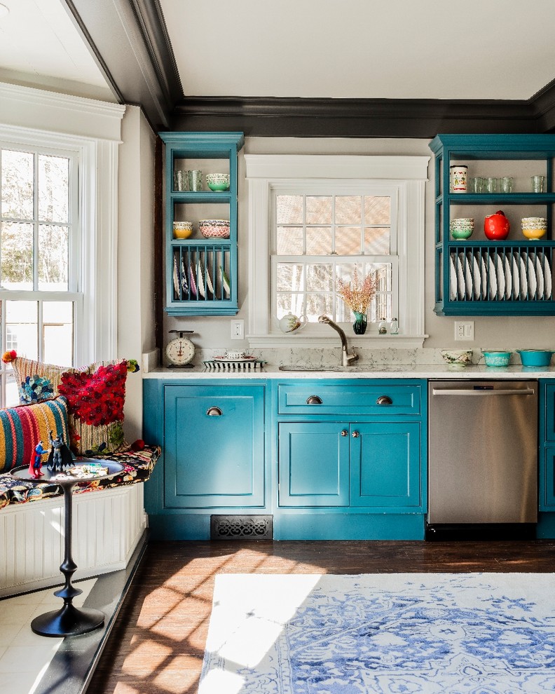 Inspiration for a huge country galley medium tone wood floor eat-in kitchen remodel in Boston with a farmhouse sink, recessed-panel cabinets, turquoise cabinets, quartz countertops, red backsplash, brick backsplash, stainless steel appliances and an island