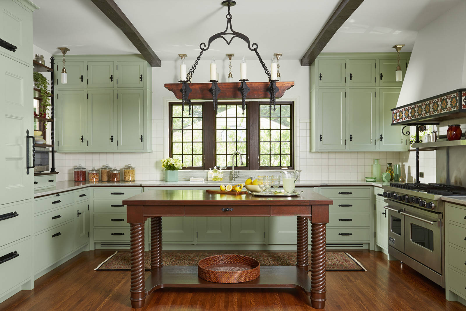 Green kitchen inspo. DIY Mediterranean & Spanish style kitchen. Green  cabinets with metal accents.