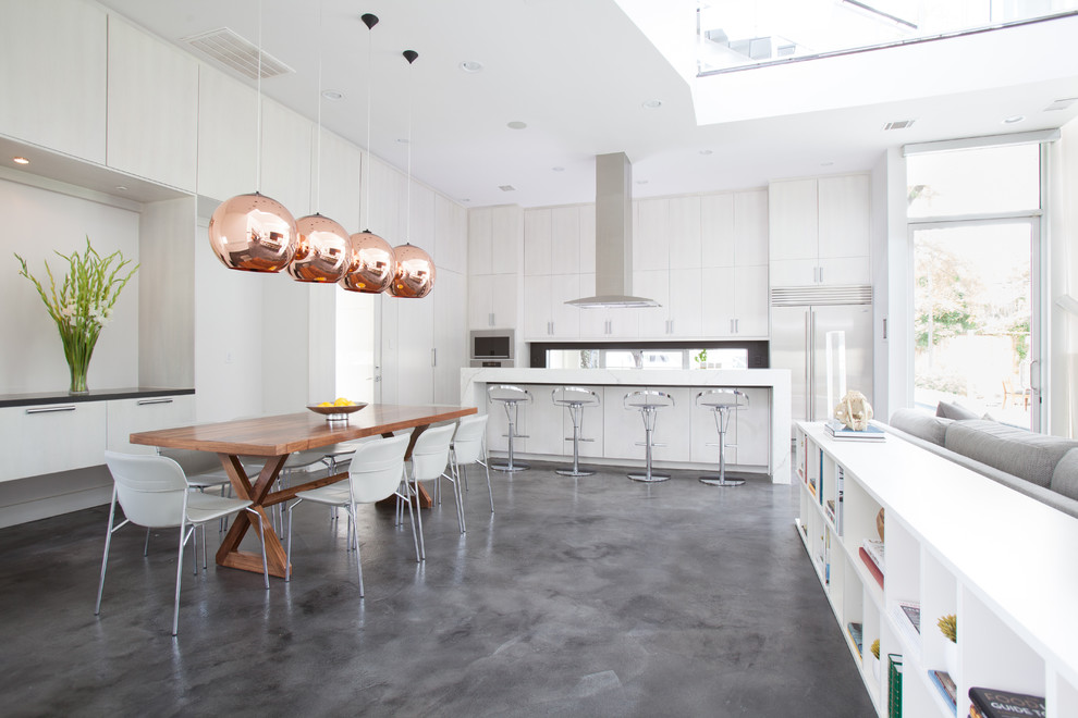 Inspiration for a contemporary gray floor eat-in kitchen remodel in Houston with flat-panel cabinets, white cabinets and stainless steel appliances