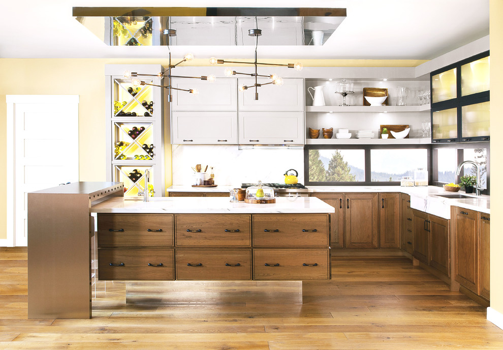 Trendy l-shaped medium tone wood floor kitchen photo in Denver with raised-panel cabinets, medium tone wood cabinets and an island