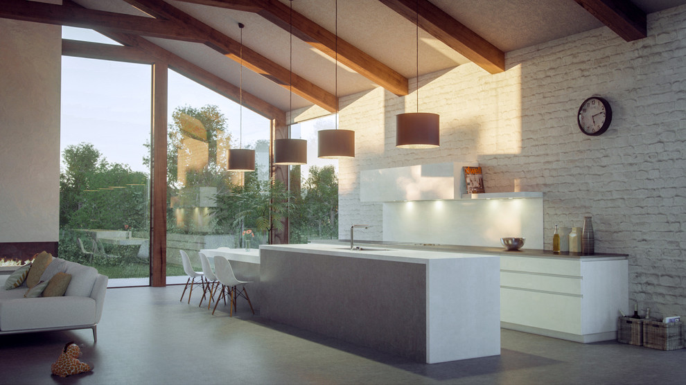 Immagine di una cucina minimal di medie dimensioni con ante lisce, ante bianche, top in superficie solida, paraspruzzi bianco, paraspruzzi con lastra di vetro, elettrodomestici da incasso e pavimento in cemento