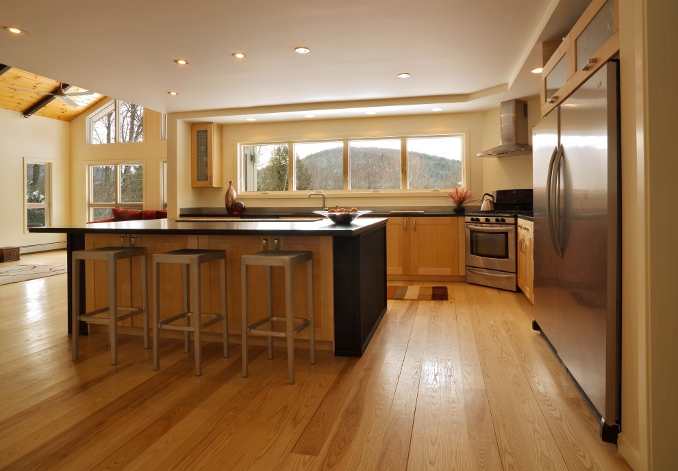 Example of a trendy kitchen design in Burlington with stainless steel appliances