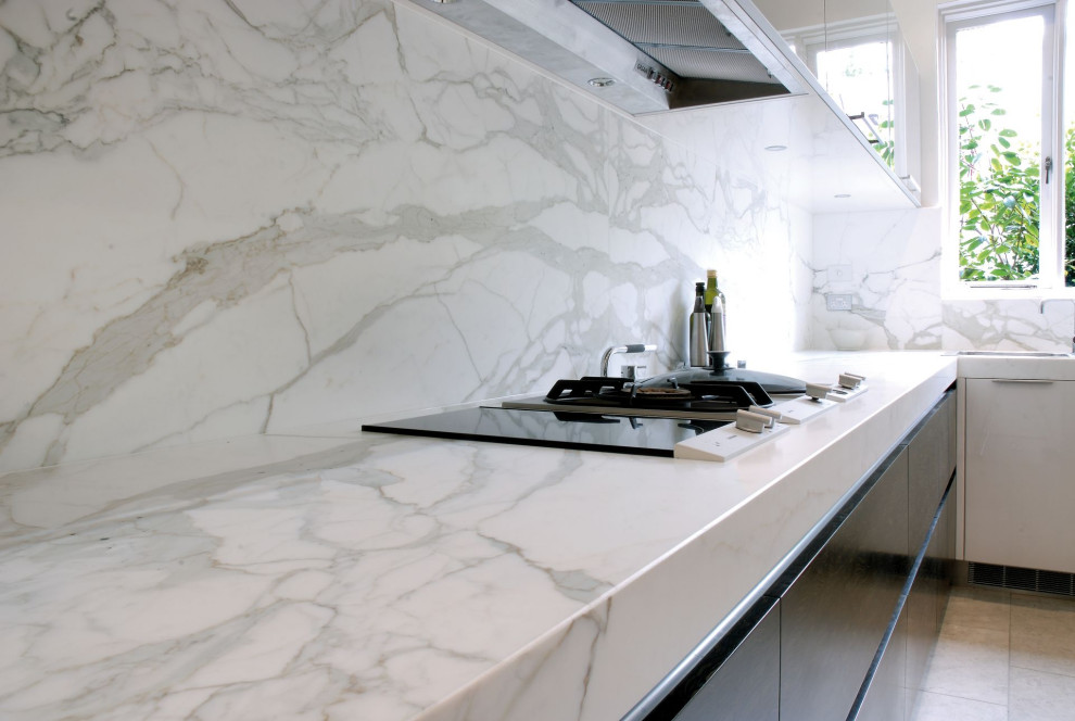 Inspiration for a country kitchen in London with quartz worktops and white worktops.
