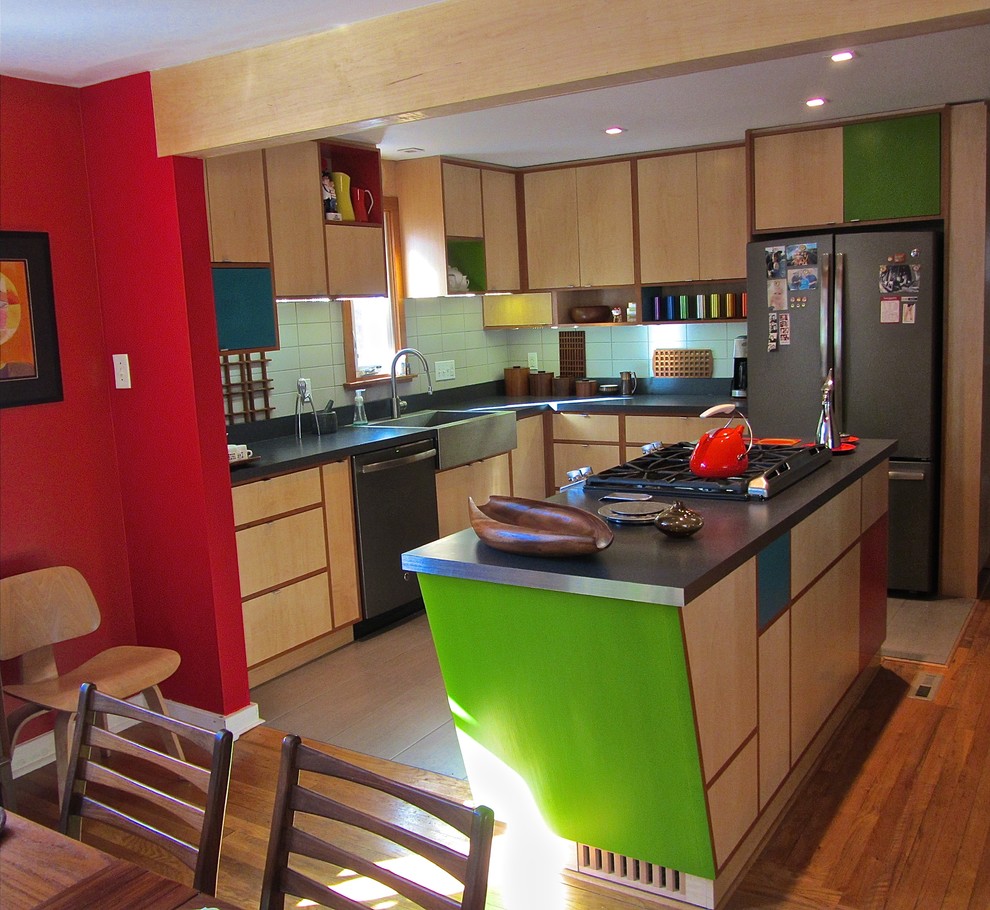 Example of a small 1960s l-shaped kitchen design in Other with flat-panel cabinets, laminate countertops and an island