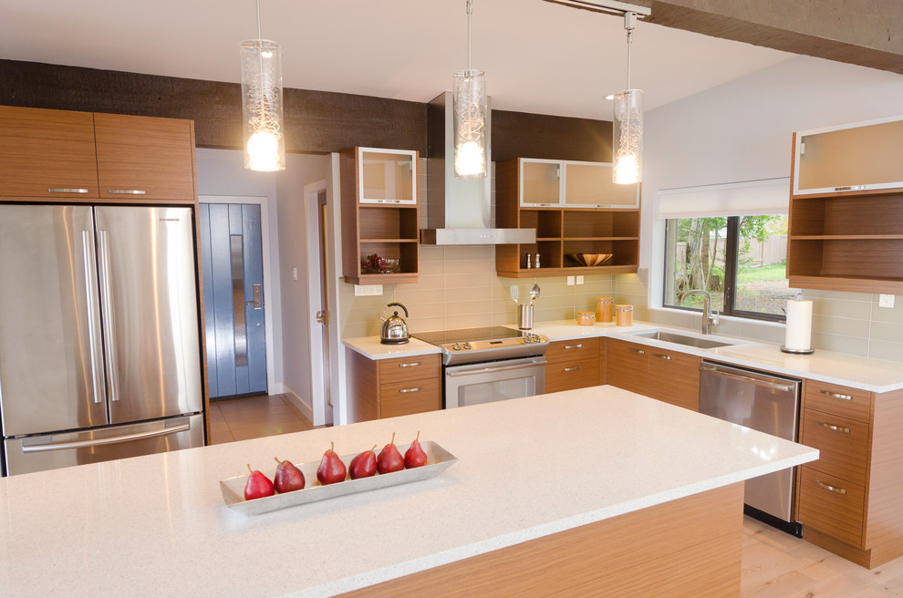 Mid-century modern kitchen photo in Vancouver with a single-bowl sink and quartz countertops
