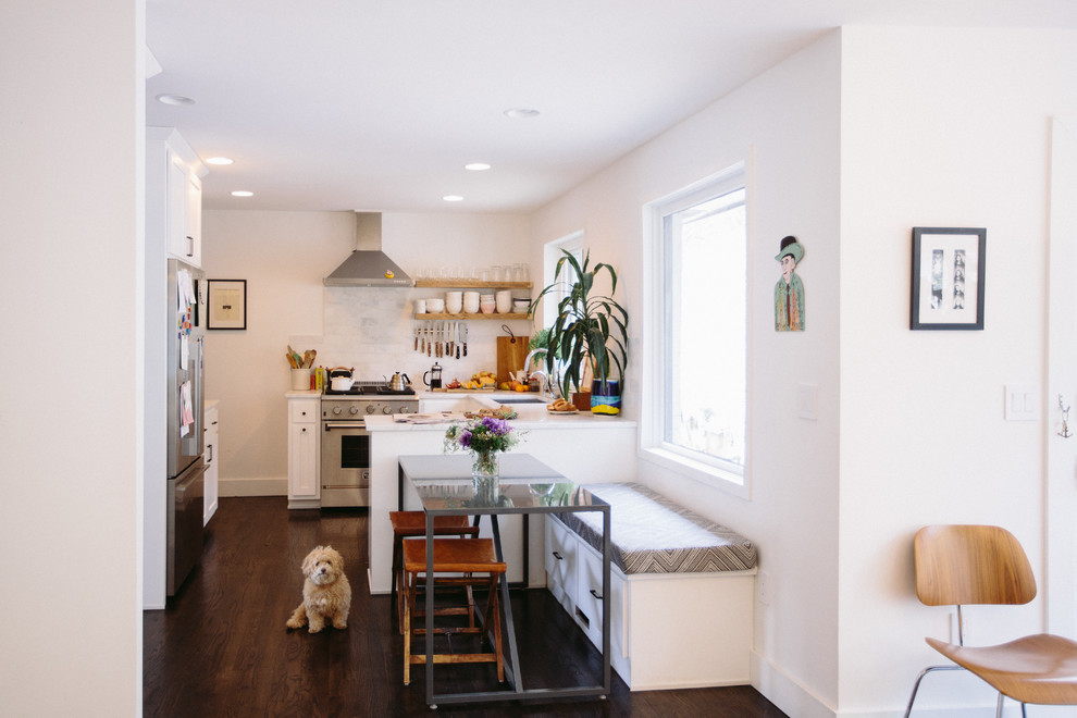 Eat-in kitchen - mid-sized transitional u-shaped dark wood floor and brown floor eat-in kitchen idea in Nashville with gray backsplash, white cabinets, an undermount sink, shaker cabinets, stainless steel appliances, no island, marble countertops and marble backsplash