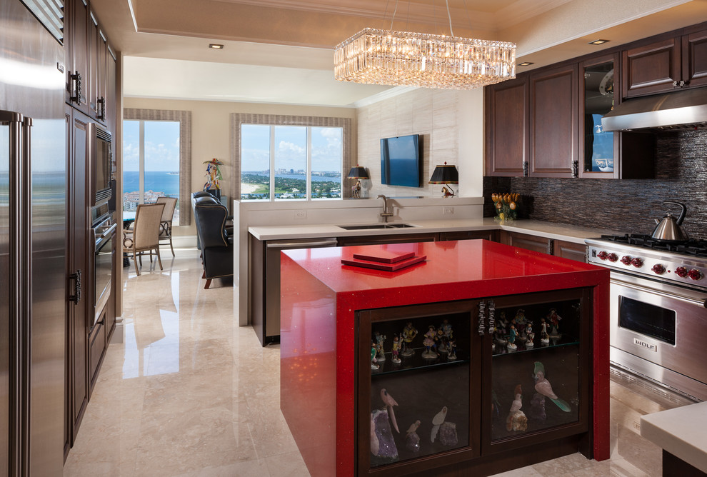 Inspiration for a mid-sized contemporary u-shaped marble floor and beige floor eat-in kitchen remodel in Miami with raised-panel cabinets, dark wood cabinets, brown backsplash, stainless steel appliances, an undermount sink, quartz countertops, an island and red countertops