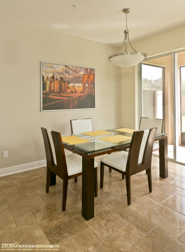 Medium sized classic open plan dining room in Orlando with travertine flooring.