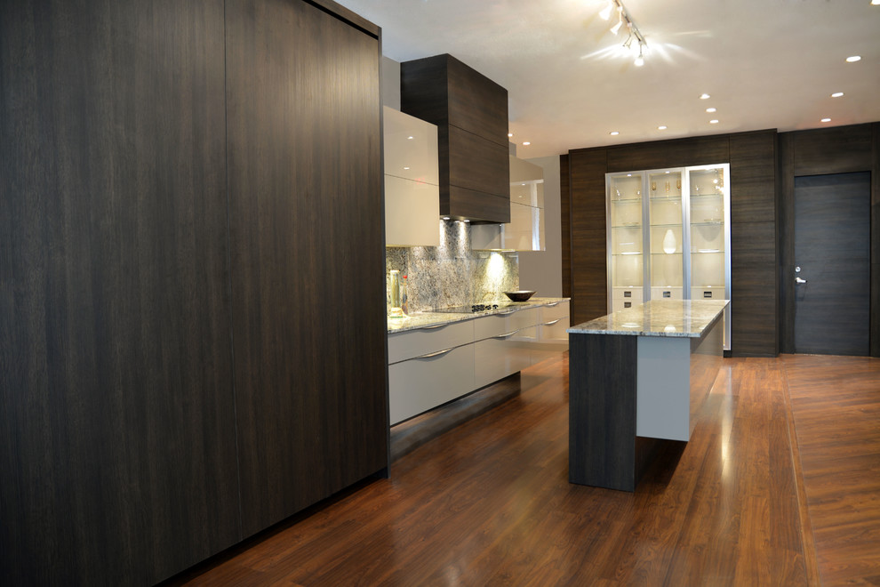 Photo of a medium sized modern u-shaped kitchen/diner in Miami with a double-bowl sink, flat-panel cabinets, dark wood cabinets, marble worktops, white splashback, stainless steel appliances, dark hardwood flooring and an island.