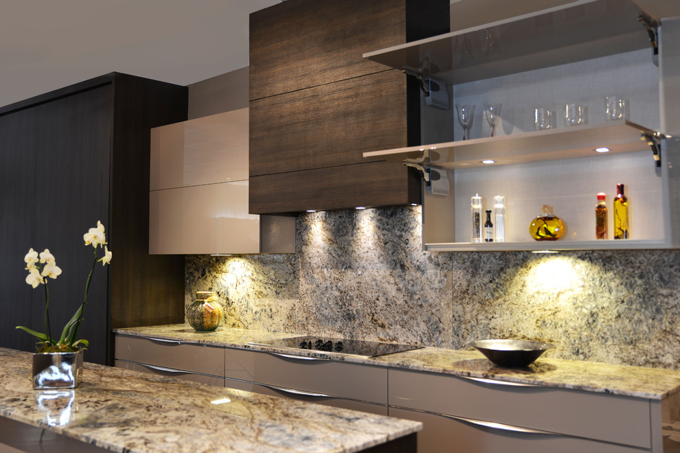 Example of a mid-sized minimalist u-shaped dark wood floor eat-in kitchen design in Miami with a double-bowl sink, flat-panel cabinets, dark wood cabinets, marble countertops, white backsplash, stainless steel appliances and an island