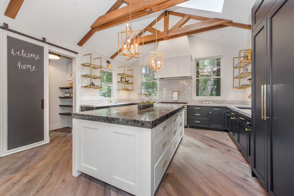 Eat-in kitchen - mid-sized transitional u-shaped beige floor and medium tone wood floor eat-in kitchen idea in San Francisco with an undermount sink, open cabinets, gray backsplash, an island, black cabinets, marble countertops, stone slab backsplash and paneled appliances