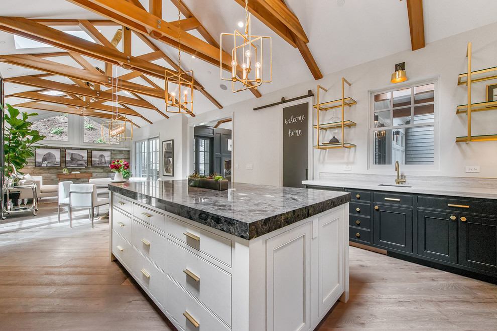 Inspiration for a mid-sized transitional u-shaped medium tone wood floor and beige floor eat-in kitchen remodel in San Francisco with black cabinets, marble countertops, gray backsplash, paneled appliances, an island, an undermount sink, open cabinets and stone slab backsplash