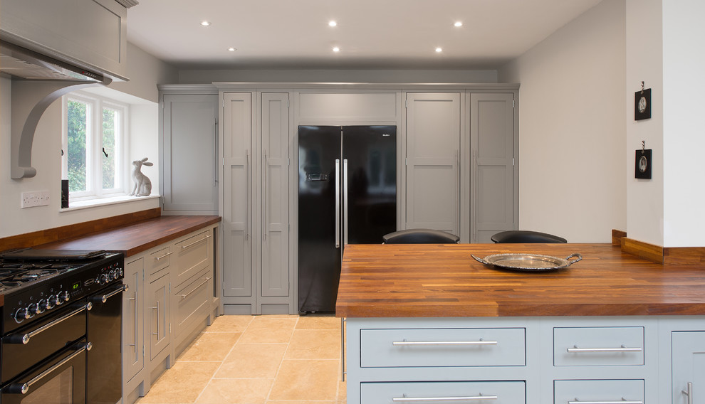 Large classic kitchen in Gloucestershire with shaker cabinets.