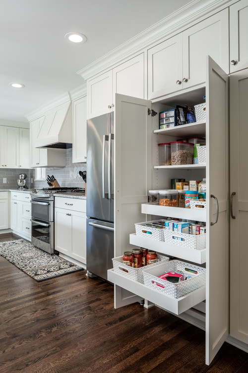 Stainless Steel and Style: Pantry Cabinet Ideas with White Shaker Cabinets