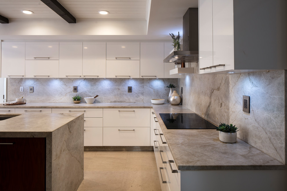 Inspiration for a midcentury u-shaped enclosed kitchen in Miami with a double-bowl sink, flat-panel cabinets, white cabinets, marble worktops, grey splashback, marble splashback, stainless steel appliances, an island, beige floors and grey worktops.