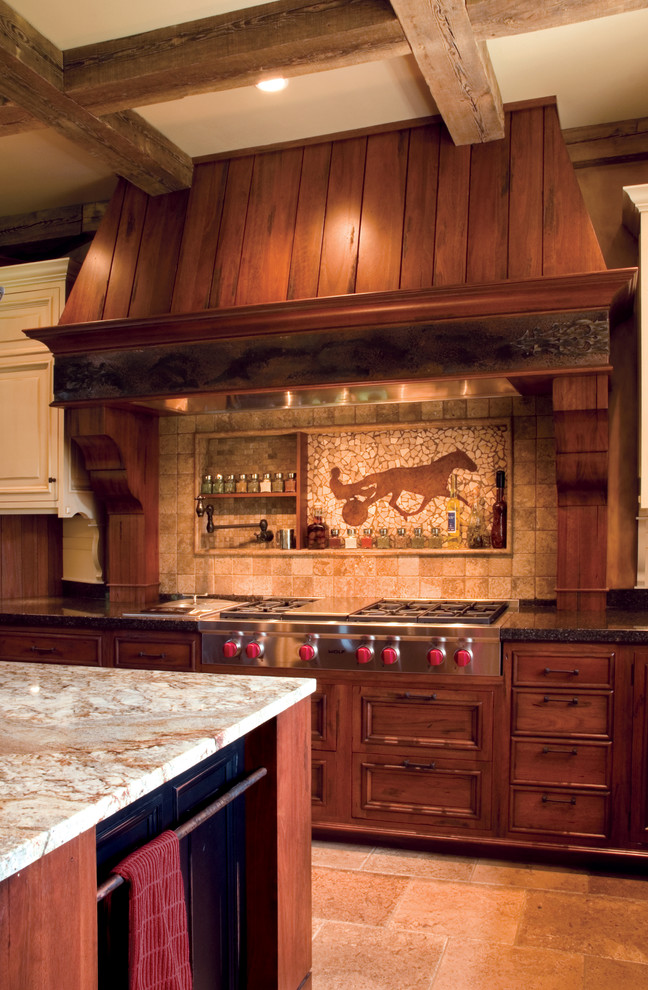 ミネアポリスにあるラスティックスタイルのおしゃれなキッチン (シルバーの調理設備) の写真