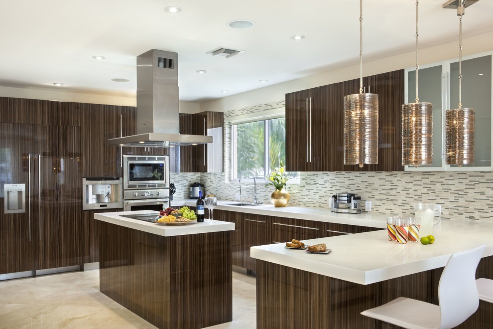 Eat-in kitchen - large transitional l-shaped marble floor and beige floor eat-in kitchen idea in Miami with an island, flat-panel cabinets, brown cabinets, quartz countertops, multicolored backsplash, matchstick tile backsplash, stainless steel appliances and an undermount sink