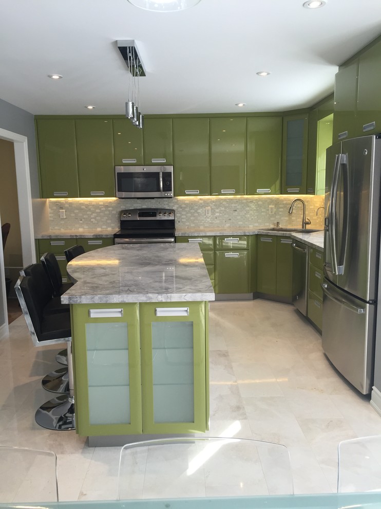 Inspiration for a large contemporary l-shaped kitchen/diner in Toronto with a submerged sink, flat-panel cabinets, green cabinets, quartz worktops, white splashback, mosaic tiled splashback, stainless steel appliances, marble flooring and an island.