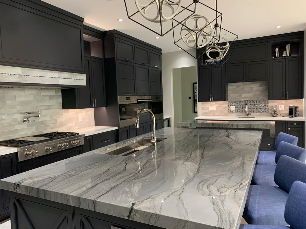 Eat-in kitchen - huge transitional u-shaped porcelain tile eat-in kitchen idea in Phoenix with a single-bowl sink, blue cabinets, quartzite countertops, green backsplash, stainless steel appliances, an island and gray countertops